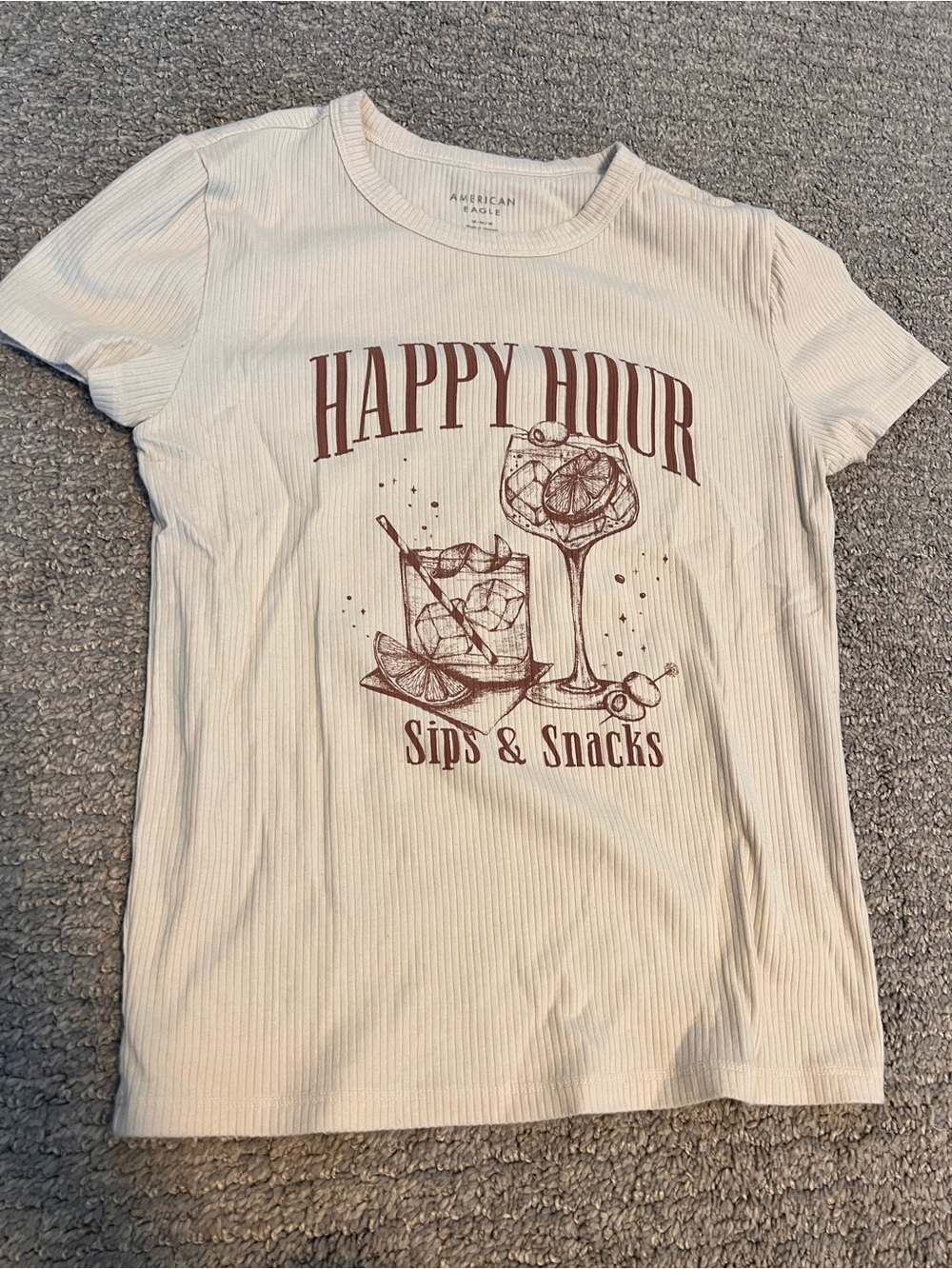 American Eagle Outfitters Cream Tee with Brown 'Happy Hour' Graphic